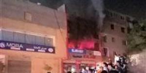 النيابة تعاين حريق في محل تجاري بالتجمع الأول  - موقع رادار